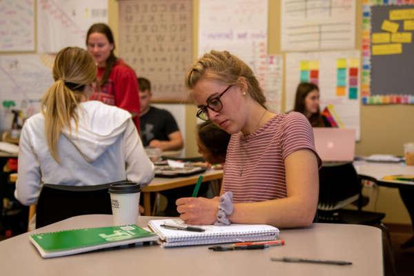 Students studying in an education classroom